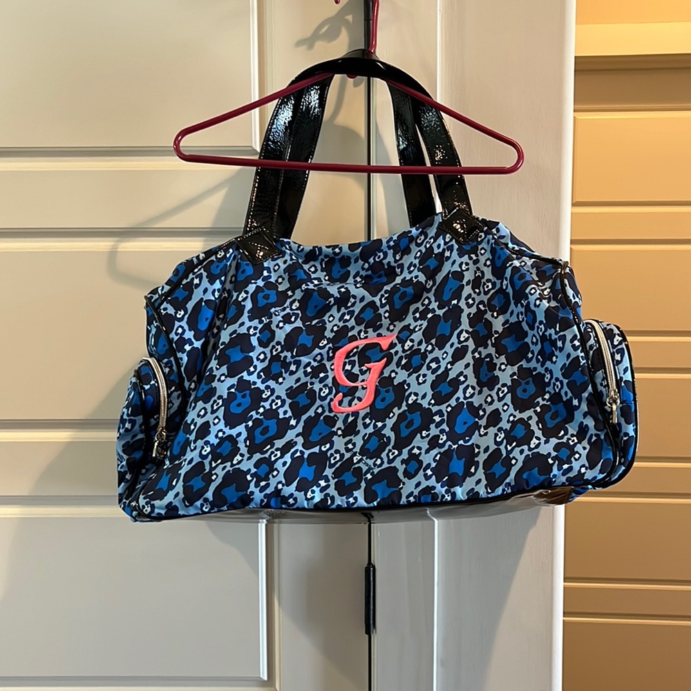 Betsy Johnson cheetah, print duffel bag used twice